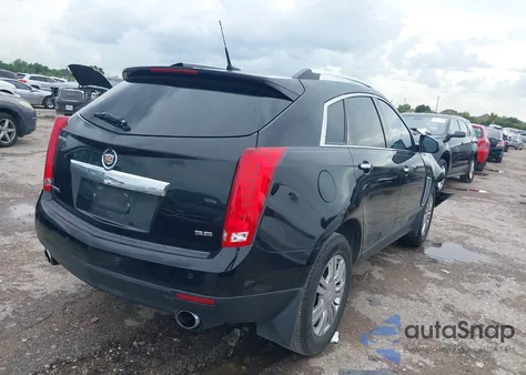 2014 Cadillac Srx Luxury Collection z USA, uszkodzony, nr VIN 3GYFNBE30ES544275
